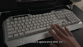 EWEADN Mechanical Gaming Keyboard Featuring a Robust Aluminum Alloy Surface, Integrated Phone Stand, Ergonomic And Sleek Design, USB Wired Plug-And-Play Connectivity, Built for Durability And Extended Use, Perfect for Office Typing And PC Gaming